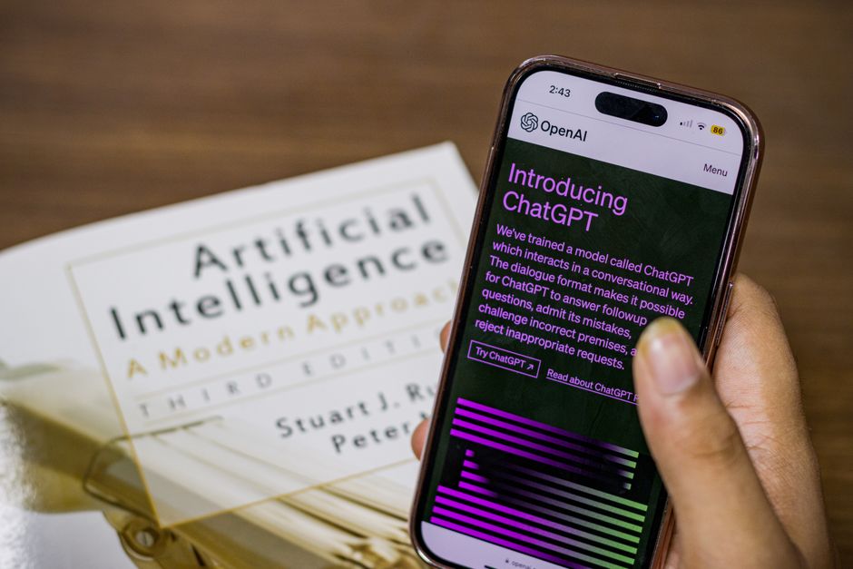 Person checking ChatGPT on a smartphone