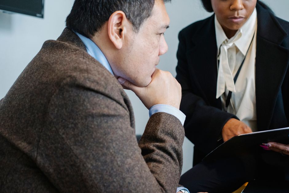 Business owner discussing an agency contract in Malaysia