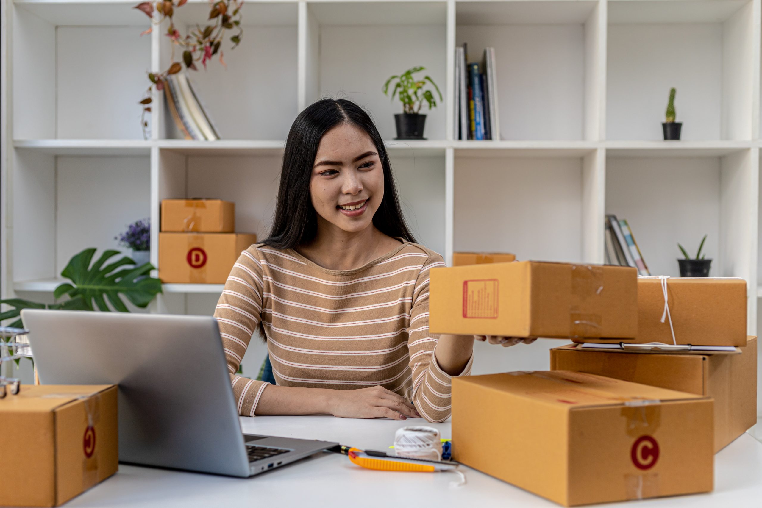 Online seller managing orders in Malaysia