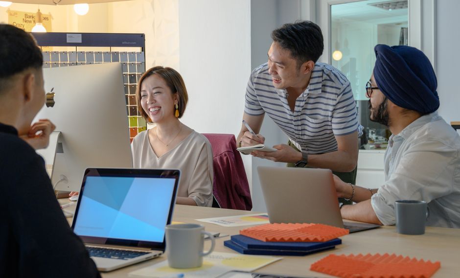 Small business team discussing brand positioning in a meeting