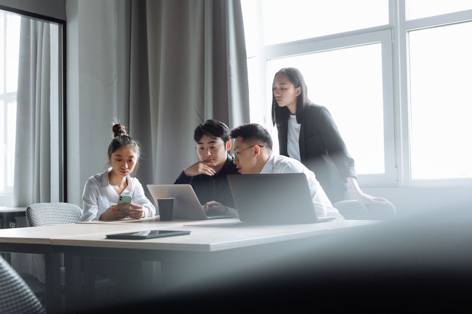 Web development team working in a Malaysian office